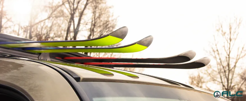 ALC - A pair of skis on top of a car