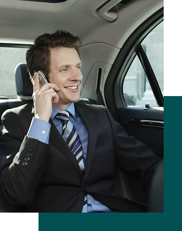 ALC-Businessman Using Mobile Phone In Car