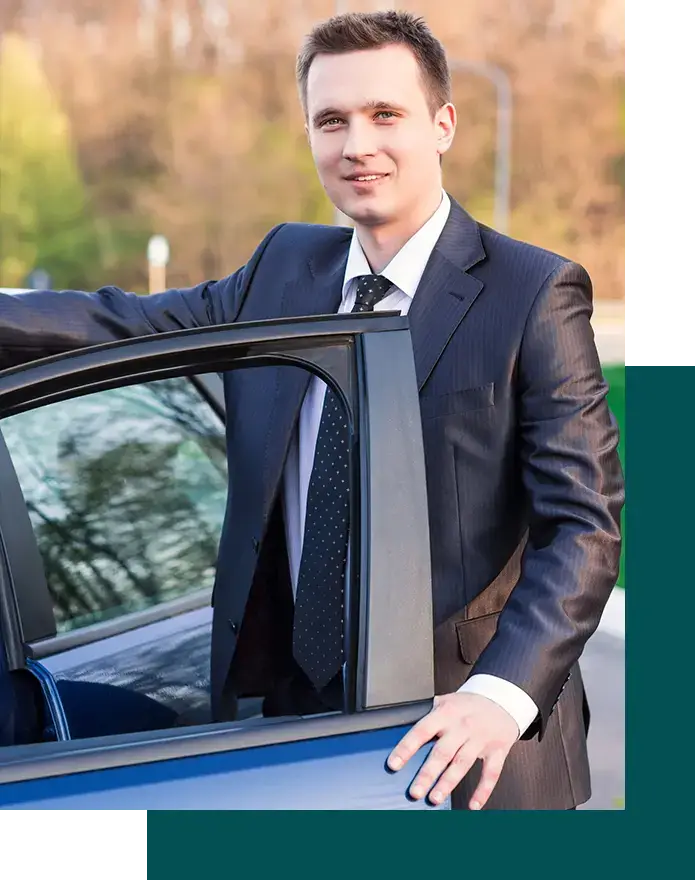 Professional Guy Beside A Car